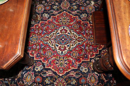 An Iranian Kashan carpet, 12ft 6in. by 8ft 11in.
